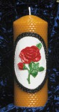 Beeswax candle with rose decoration